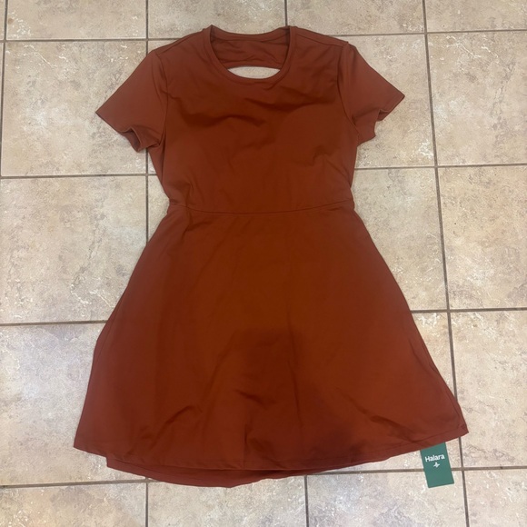 New with tags Hella short sleeve backless crisscross dress. Midi length size xl - Picture 8 of 8
